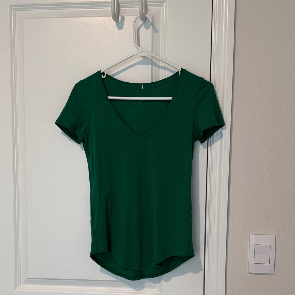 Lulu lemon love v neck cap sleeve tee. Green size 4. New. Washed, not worn.